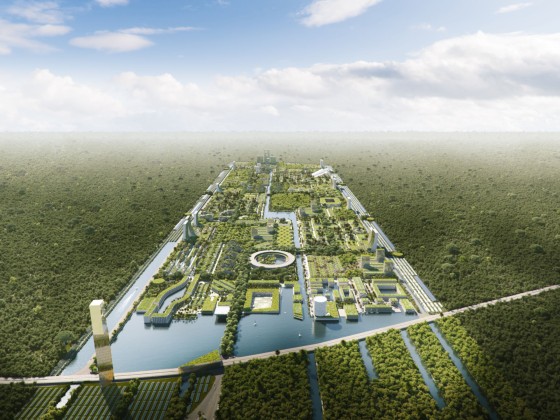 Modell einer futuristischen Stadt mitten im Dschungel mit viel Wasser und Grün.