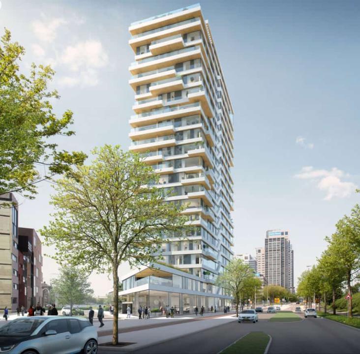 Haut-Turm in Amsterdam. Modernes Hochhaus mit unterschiedlichen Balkonbreite, nach oben hin wirkt das Gebäude breite.____